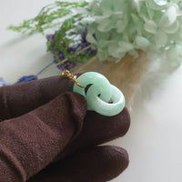 Translucent Light Apple Green Jadeite "Eternal Embrace" Pendant (JAB006384)