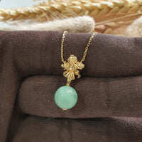 Translucent Apple Green Jadeite “Miss Joaquim” Pendant (JAB006519) 3