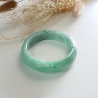 Translucent Green with Bluish Green Jadeite Bangle (JAC002514) 1